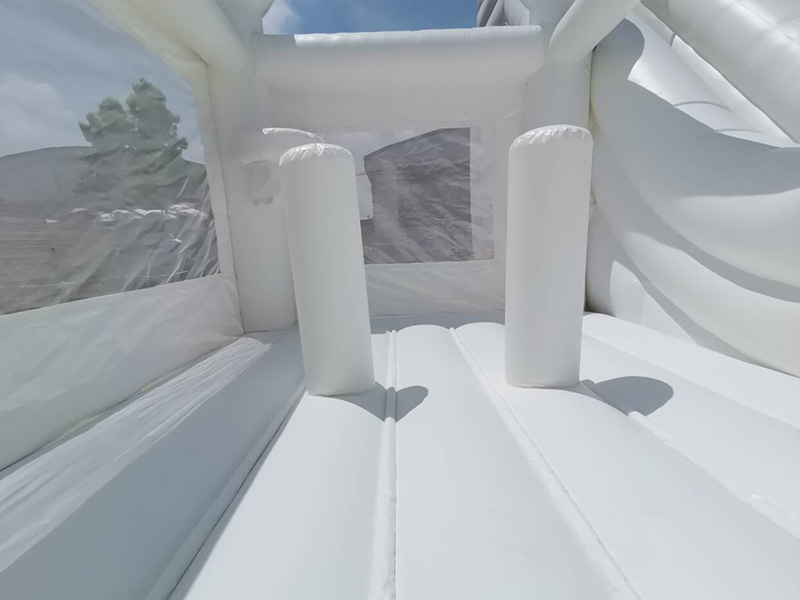 chic white bounce house for garden party